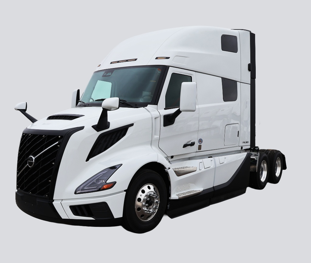 White Volvo semi truck available for commercial rental